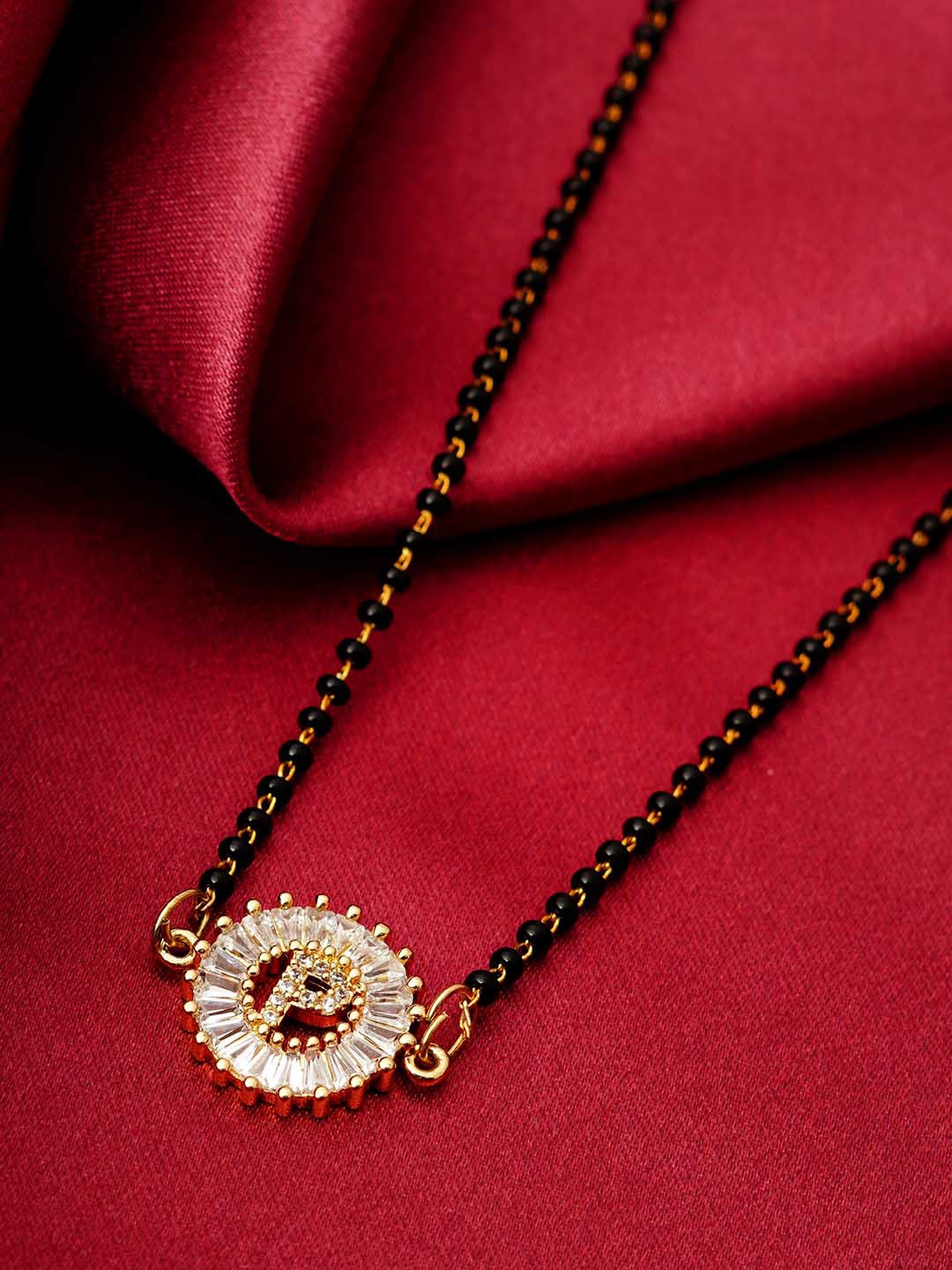 

Ferosh Black & White Gold-Plated Stone Studded & Beaded P Alphabet Mangalsutra