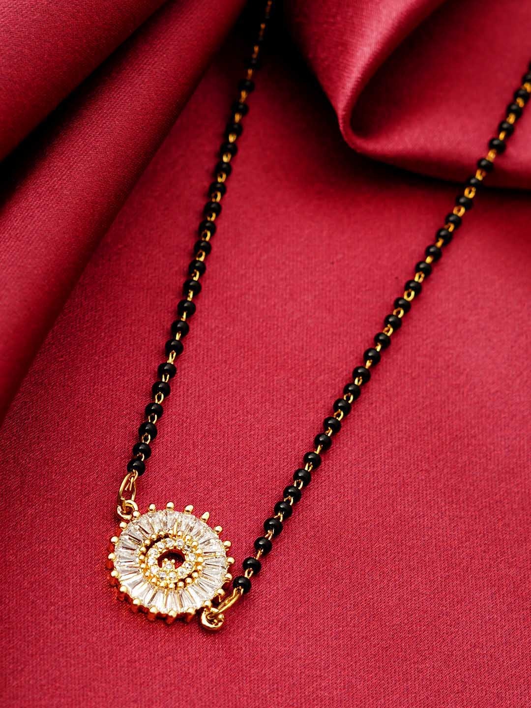 

Ferosh Black & White Gold-Plated Stone Studded & Beaded Q Alphabet Mangalsutra
