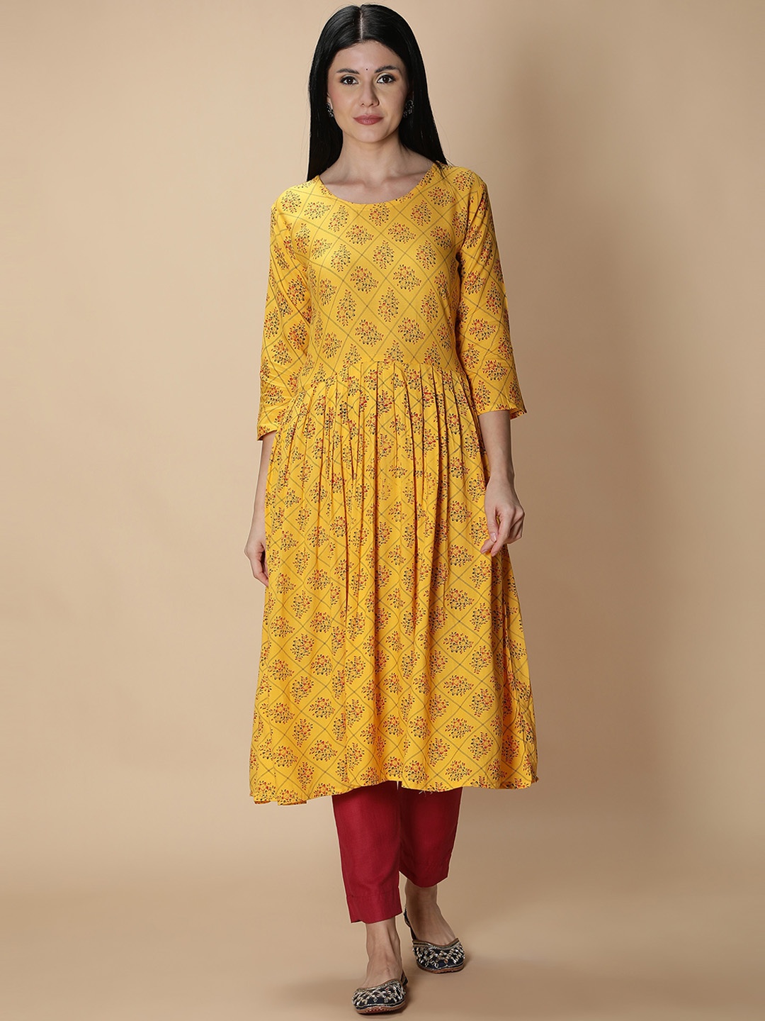 

Fabclub Women Yellow & Red Floral Printed A-Line Kurta with Trousers