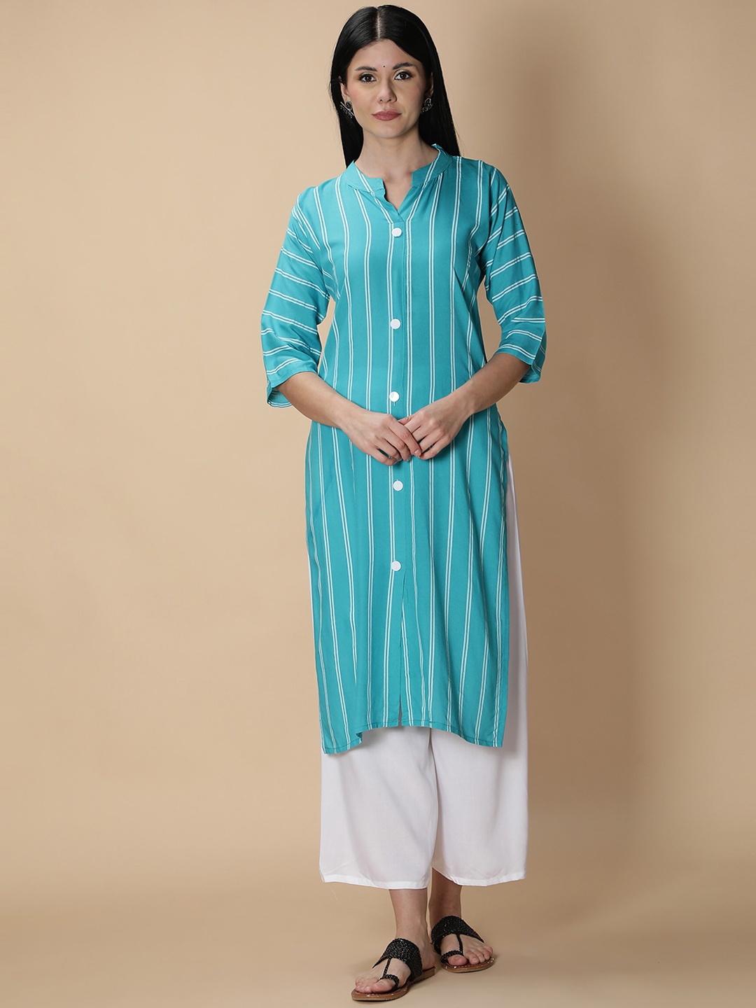 

Fabclub Women Turquoise Blue Striped Kurta with Palazzo