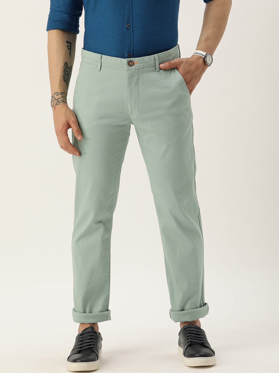 

Peter England Casuals Men Solid Super Slim Fit Trousers, Green