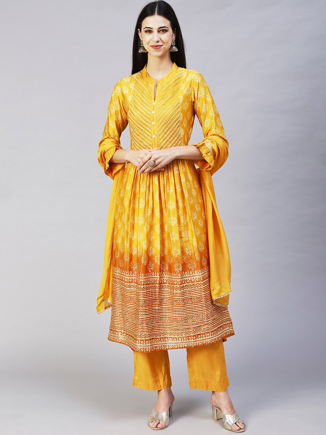 

FASHOR Women Yellow Ethnic Motifs Embroidered Pleated Beads and Stones Chanderi Silk Kurta with Trousers &