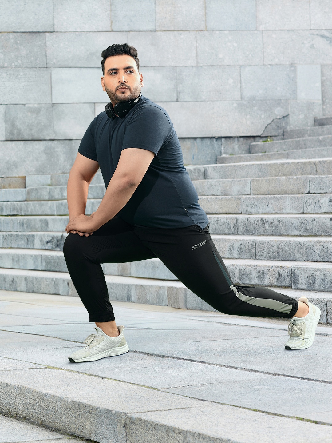 

Sztori Men Plus Size Quick Dry Sports Joggers With Brand Logo Print Detail, Black