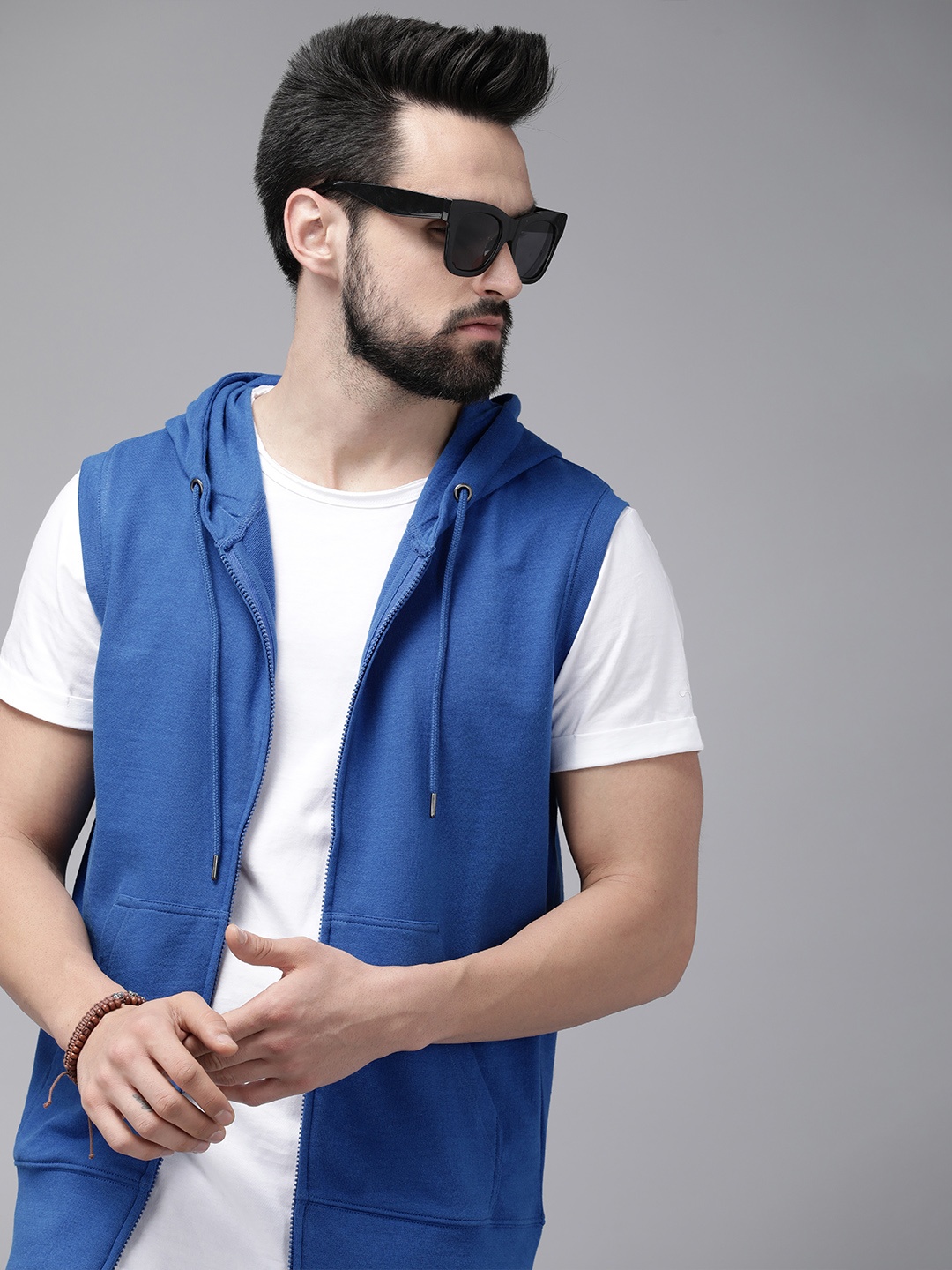 

Roadster The Lifestyle Co. Men Blue Solid Hooded Sweatshirt