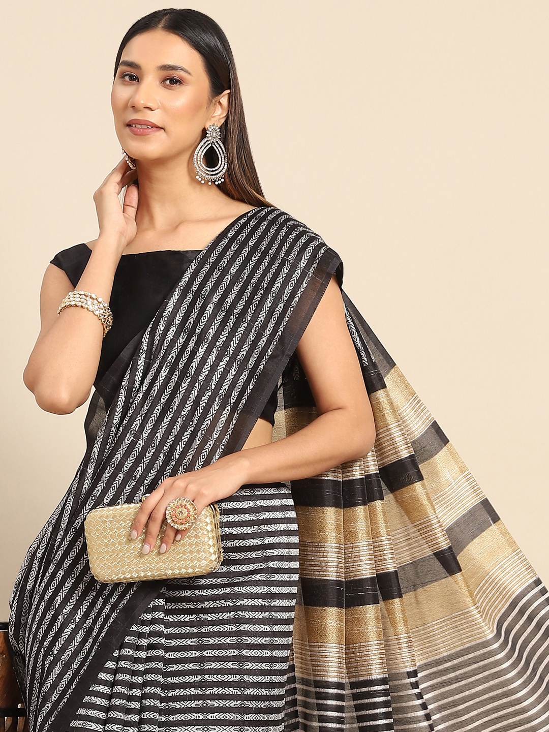 

Anouk Black & White Striped Silk Blend Block Print Saree