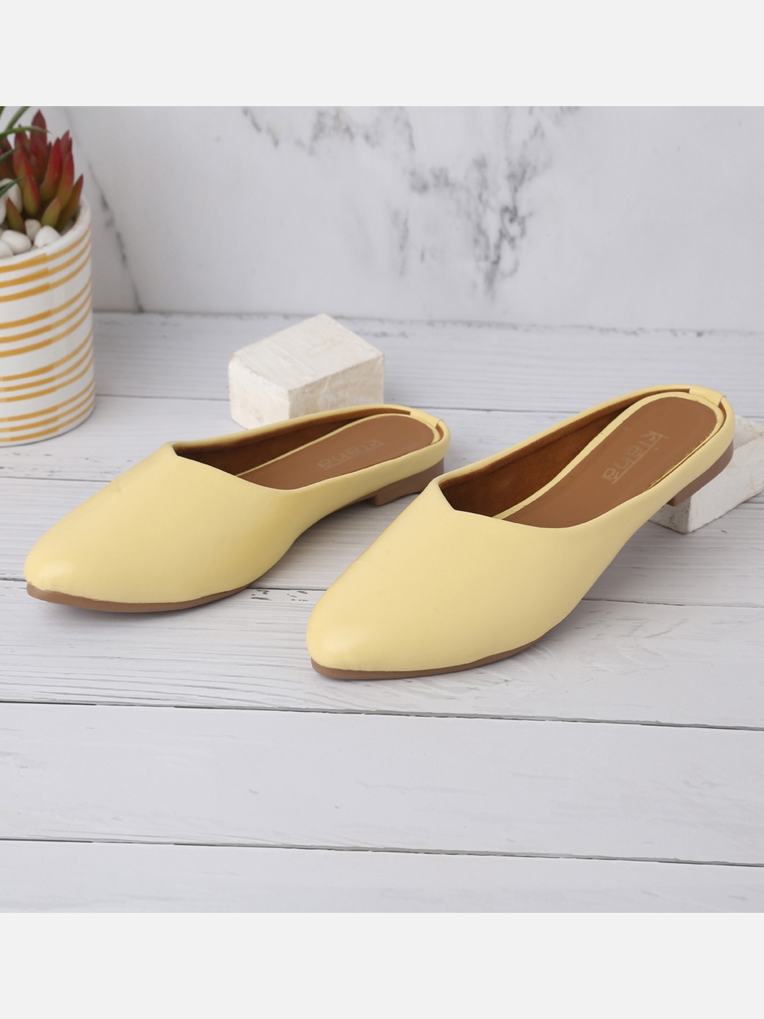 

Kiana Women Yellow Mules Flats