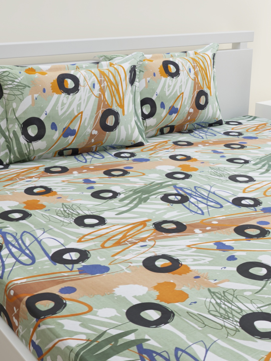 

HOME AFFAIRS Green & Orange Graphic 144 TC Pure Cotton Queen Bedsheet with 2 Pillow Covers