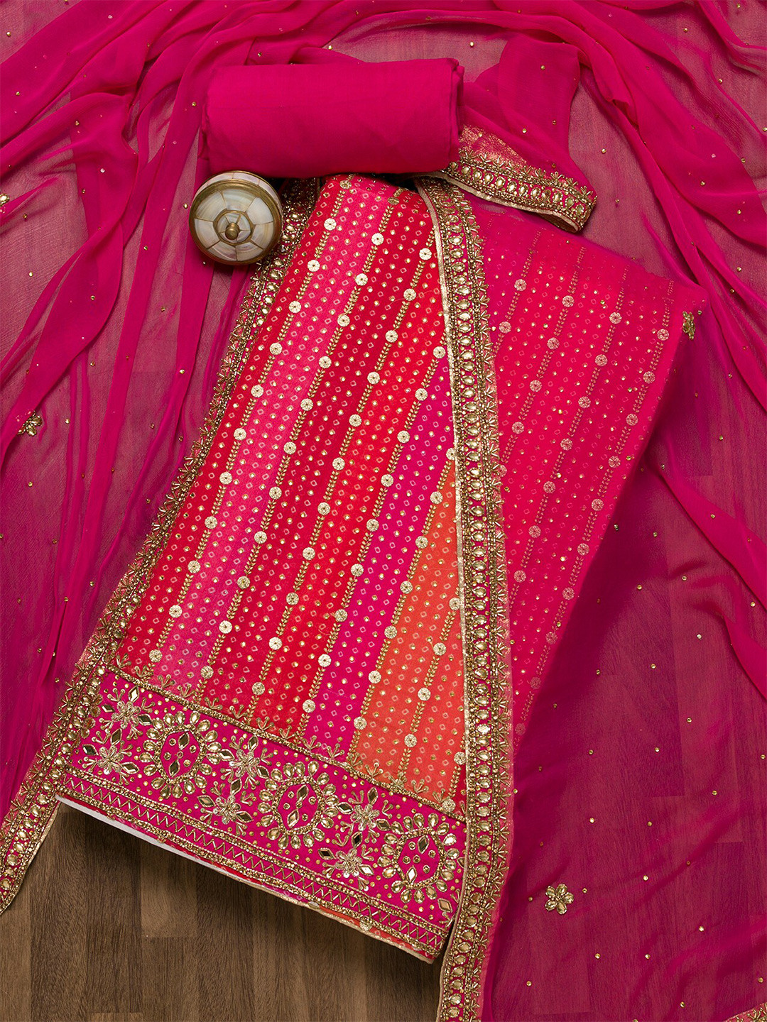 

Koskii Pink & Orange Embroidered Unstitched Dress Material