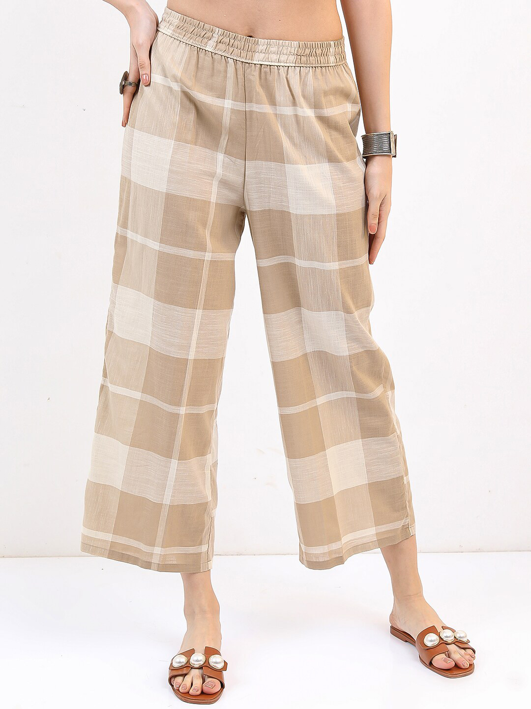 

Vishudh Women Beige & White Checked Cotton Palazzos