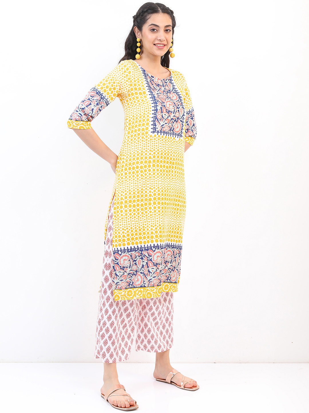 

Vishudh Women Yellow Ethnic Motifs Printed Kurta with Palazzos