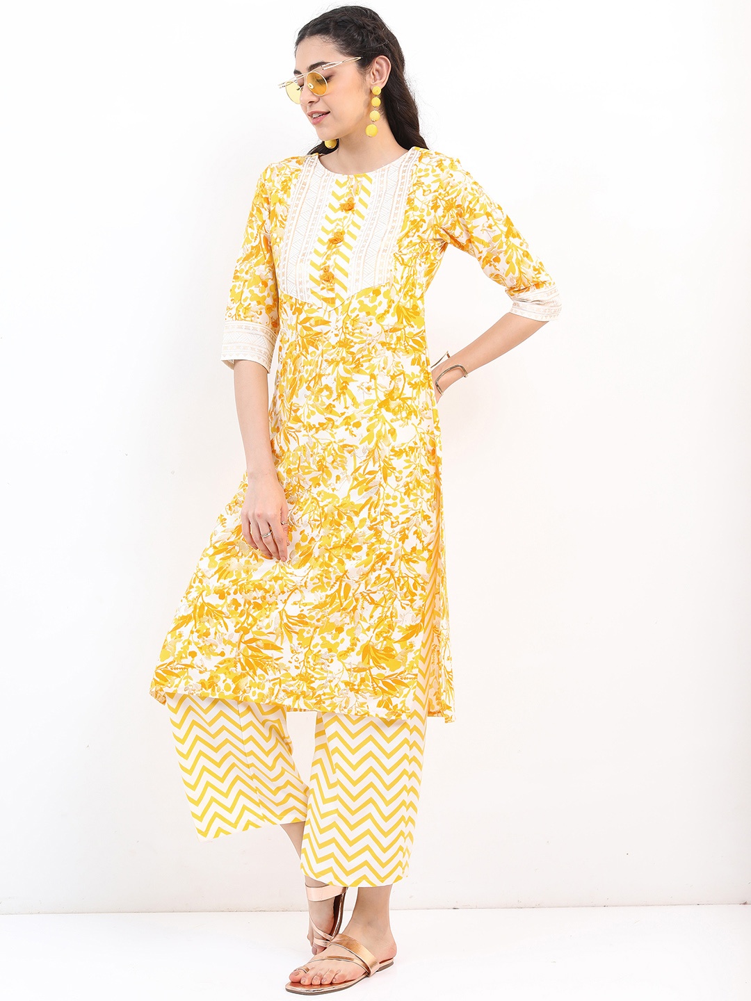 

Vishudh Women Mustard Yellow Floral Printed Kurta with Palazzos