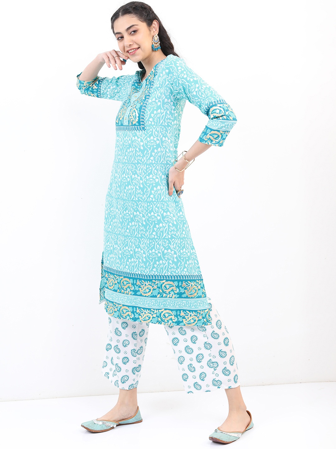 

Vishudh Women Turquoise Blue Ethnic Motifs Printed Kurta with Trouser