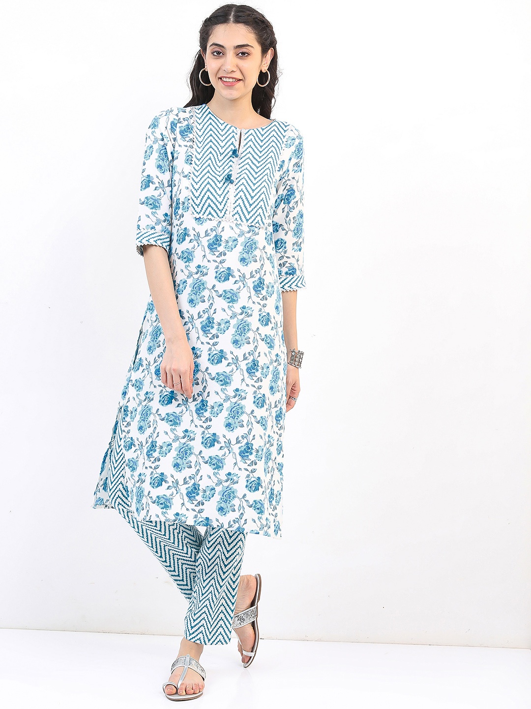 

Vishudh Women Off White Floral Printed Kurta with Trouser