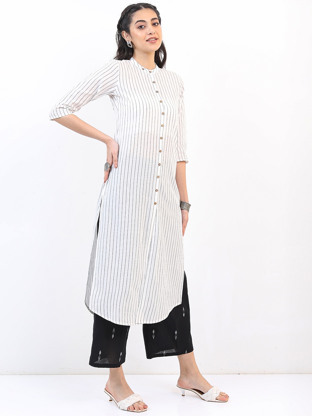 

Vishudh Women Off White & Black Striped Cotton Kurta