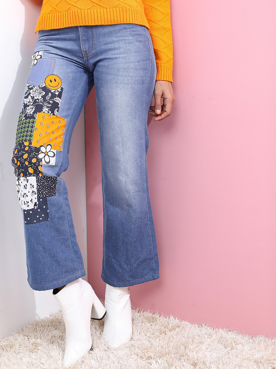 

Tokyo Talkies Women Blue Flared Highly Distressed Heavy Fade Applique Cotton Jeans