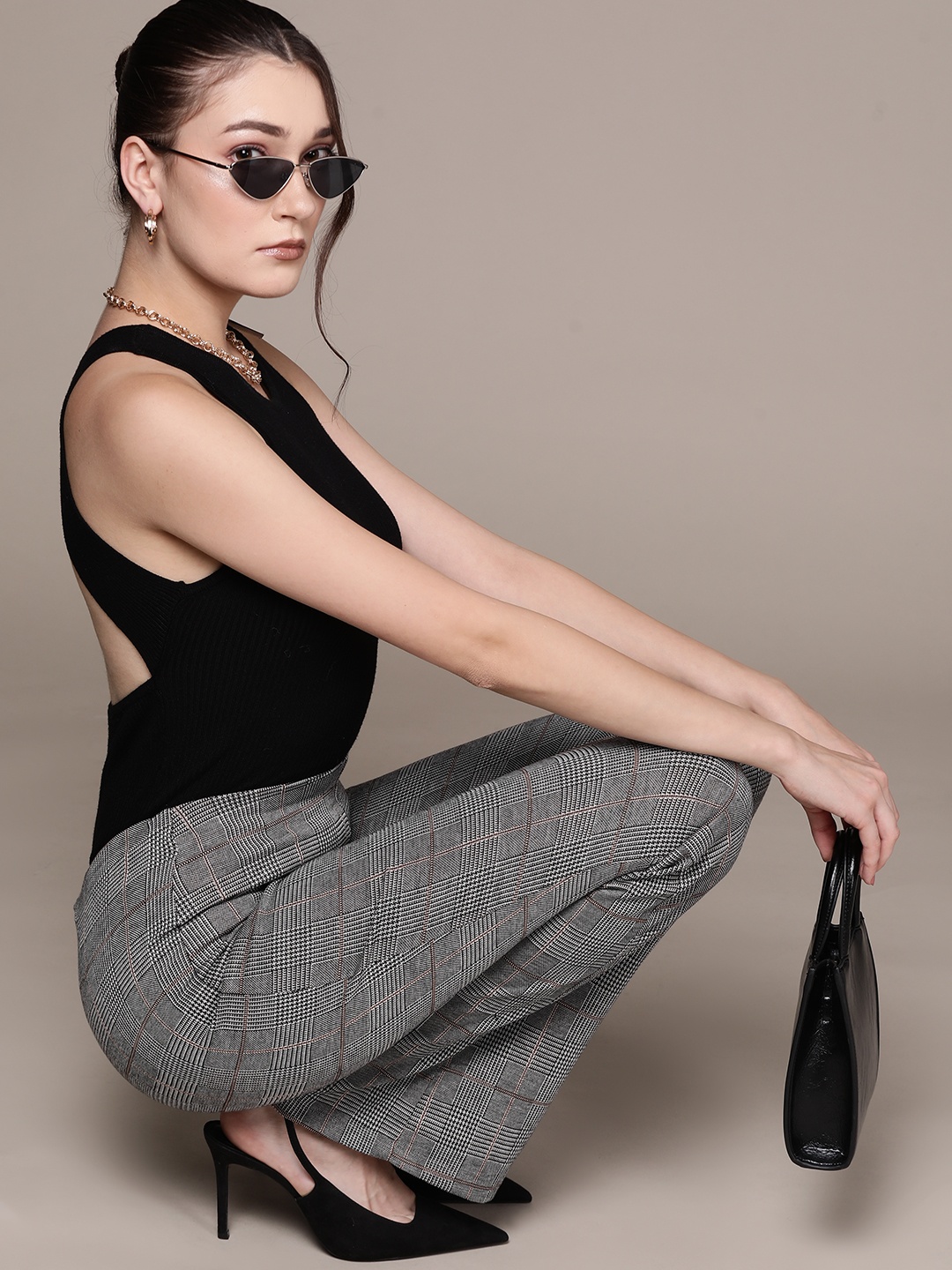 

MANGO Women Black & White Glen Checks Sustainable Flared Trousers