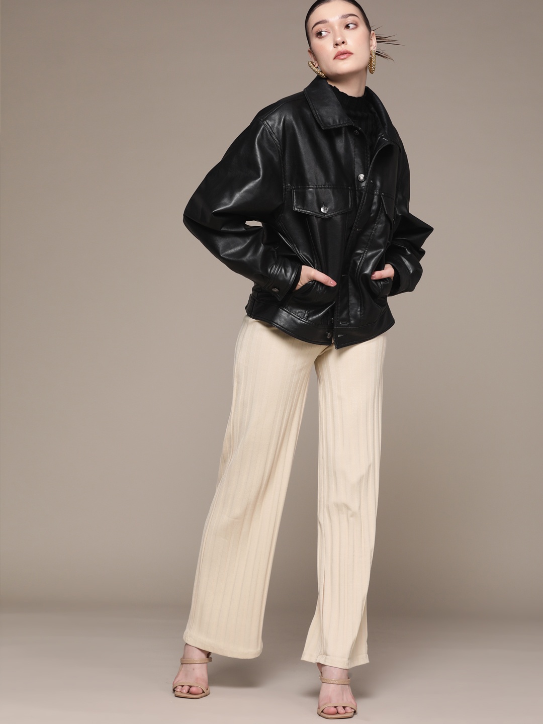 

MANGO Women Beige Solid Flared Knitted Trousers
