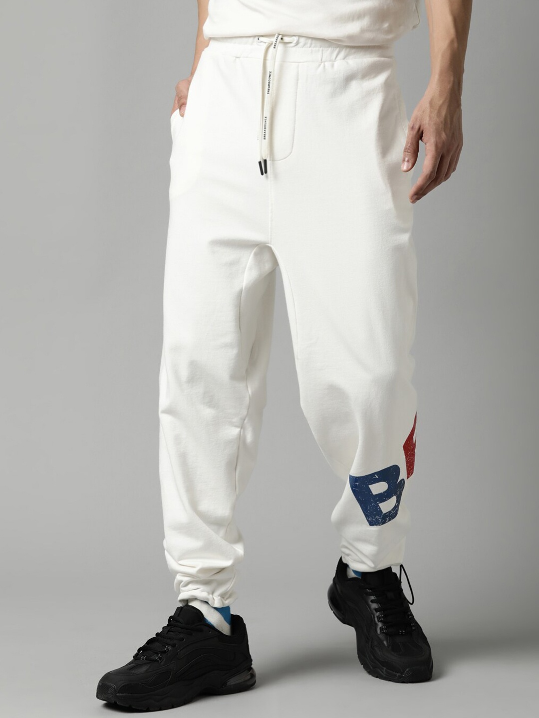 

Breakbounce Men Off White Solid Pure Cotton Joggers