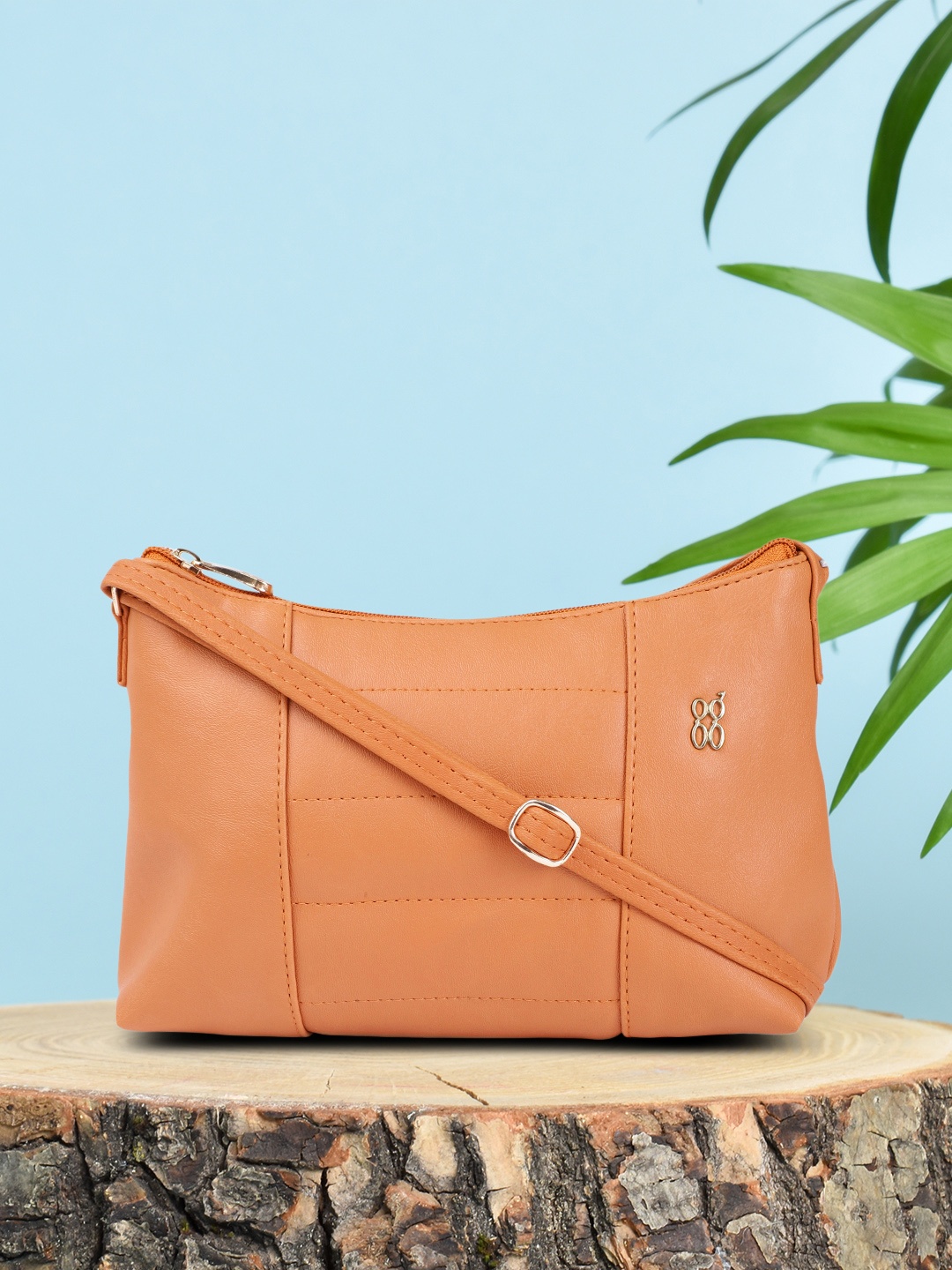 

Baggit Light Orange Sling Bag