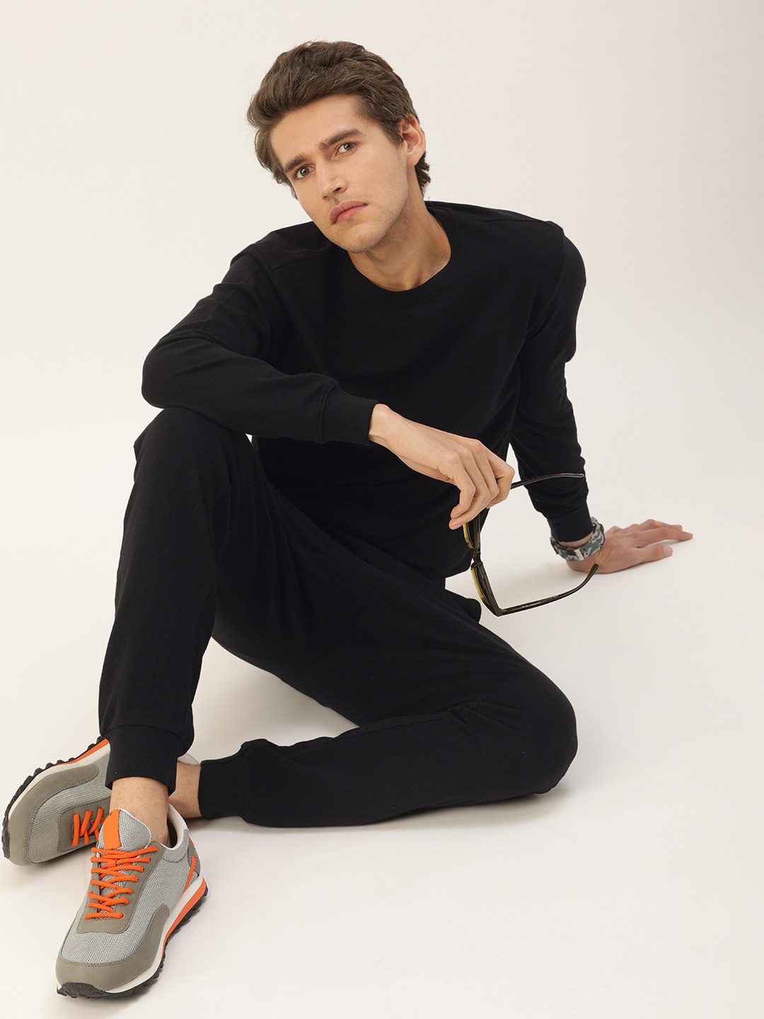

Kook N Keech Men Black Solid Sweatshirt and Joggers