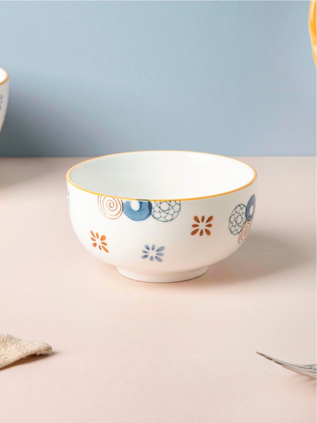 

Nestasia White & Blue Printed Microwave safe Ceramic Glossy Bowl 200ml