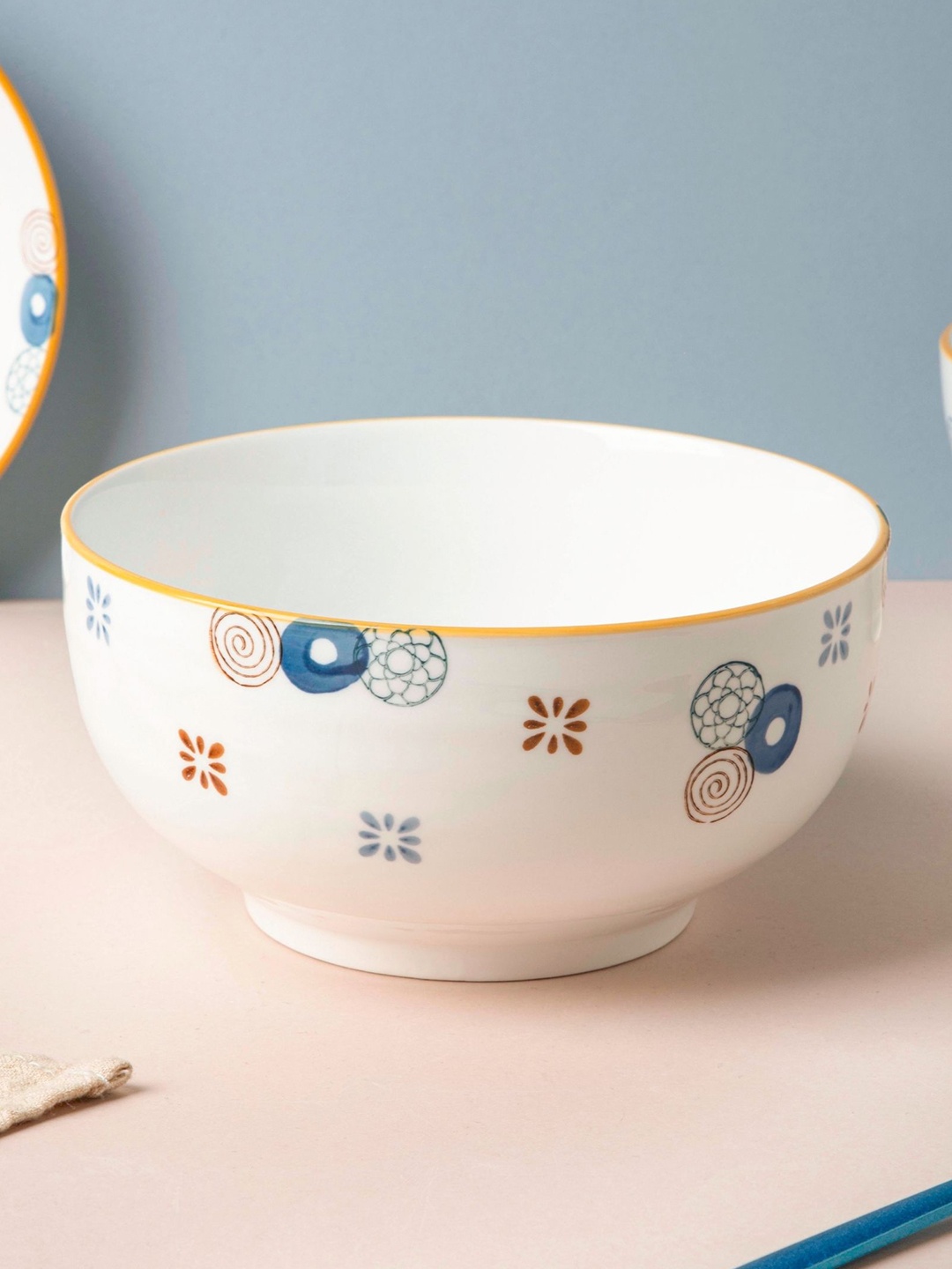 

Nestasia White & Blue Printed Microwave safe Ceramic Glossy Bowl 800ml