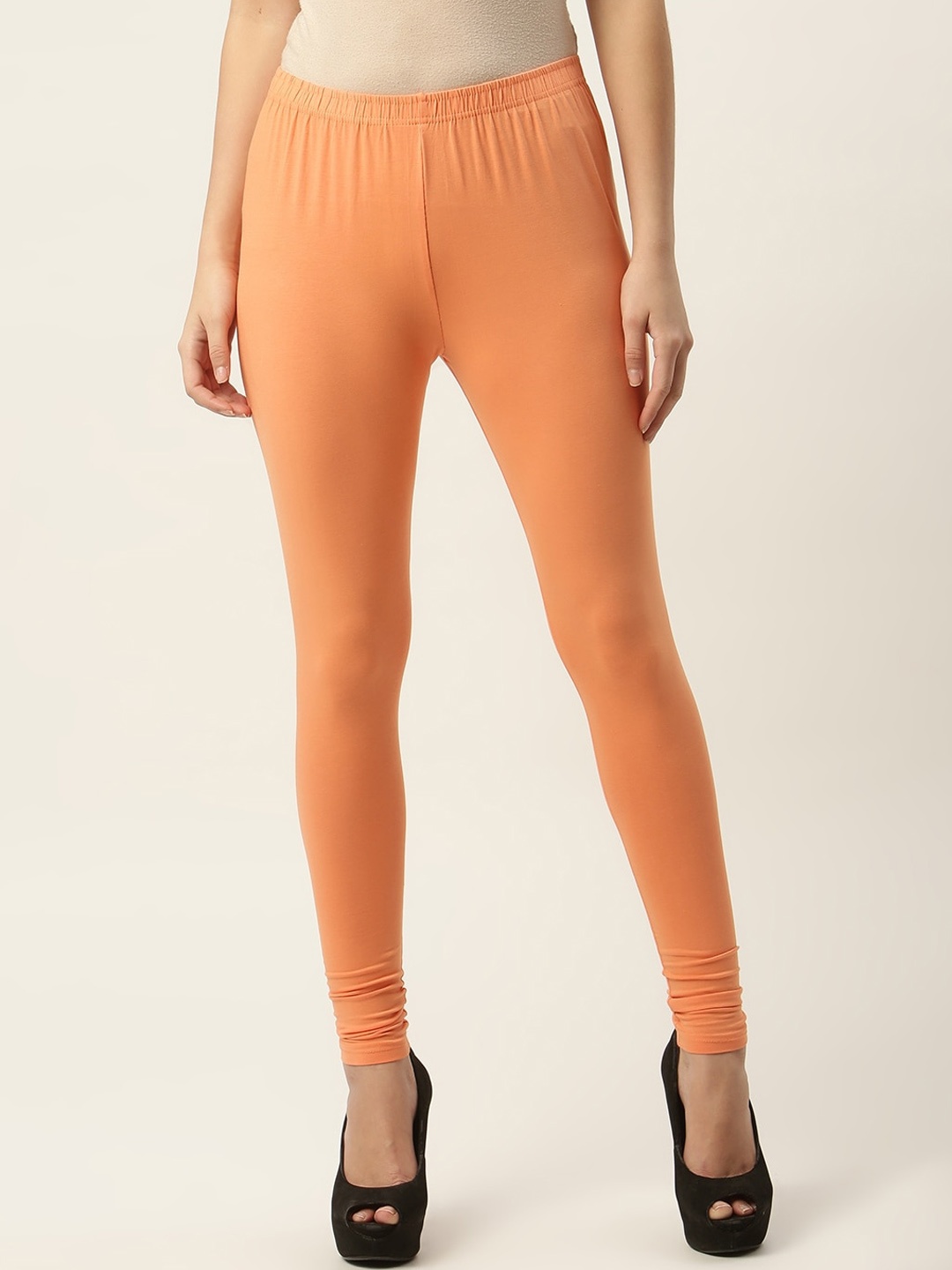 

HASRI Women Orange Solid Churidar-Length Leggings