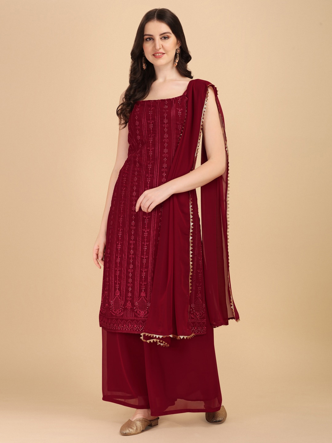 

Virah Fashion Women Maroon Embroidered Sequinned Kurti with Palazzos & With Dupatta
