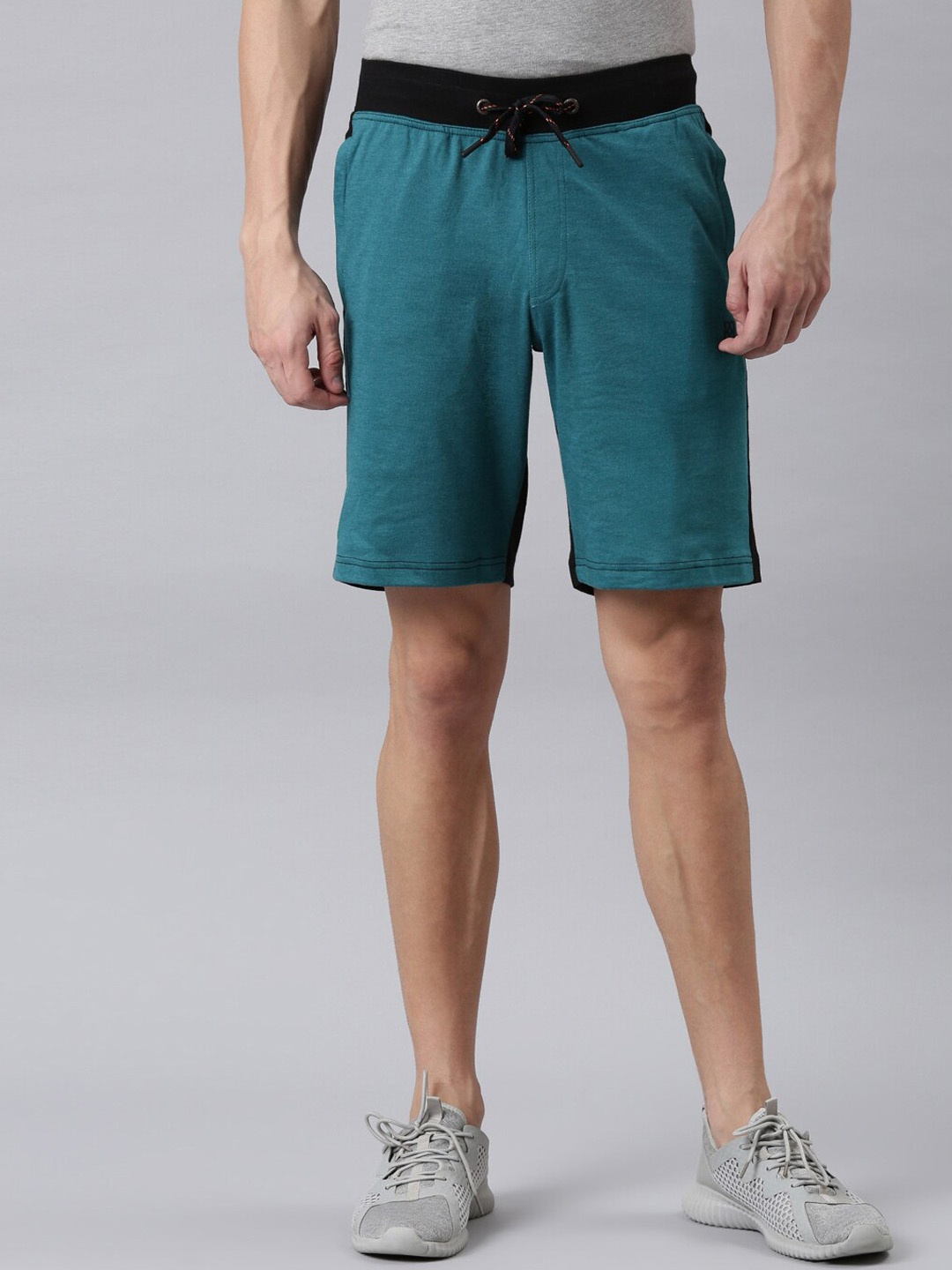 

FASO Men Teal Solid Sports Shorts