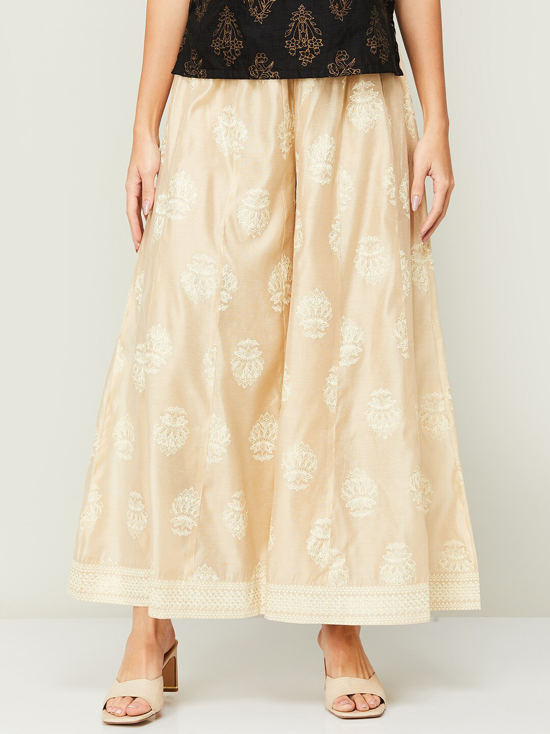 

Melange by Lifestyle Women Beige & White Silk Ethnic Motifs Printed Flared Palazzo