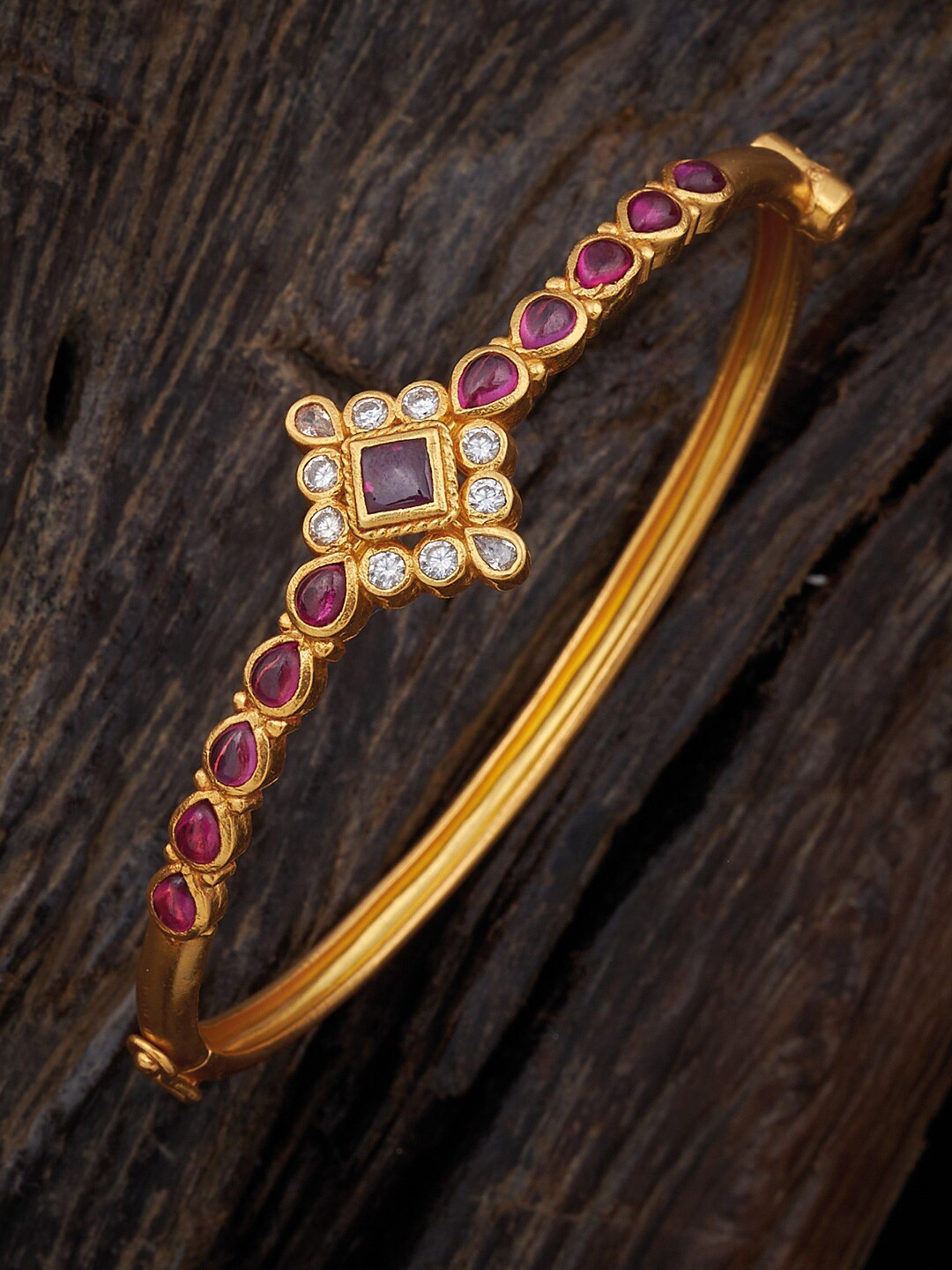 

Kushal's Fashion Jewellery Women Gold-Toned & Pink Silver Temple Kada Bracelet