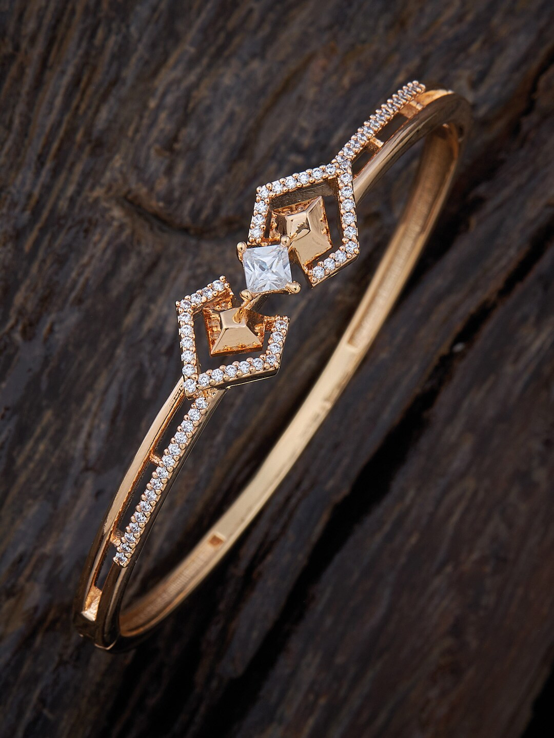 

Kushal's Fashion Jewellery Women Gold-Toned & White Cubic Zirconia Gold-Plated Kada Bracelet