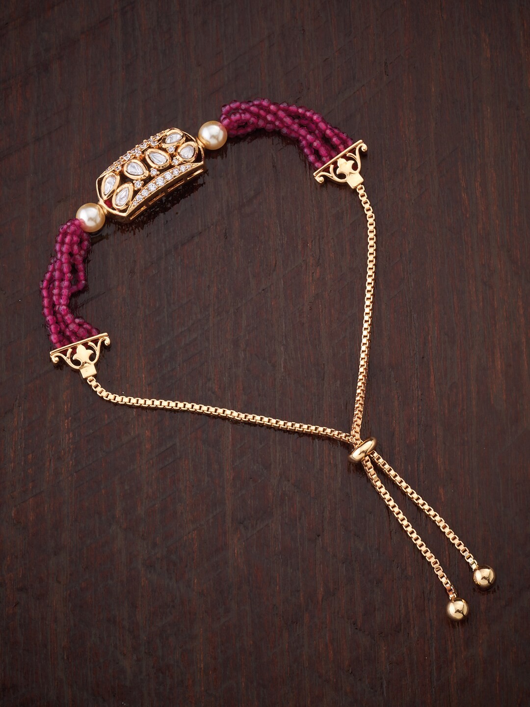 

Kushal's Fashion Jewellery Women Gold-Toned & White Kundan Wraparound Bracelet