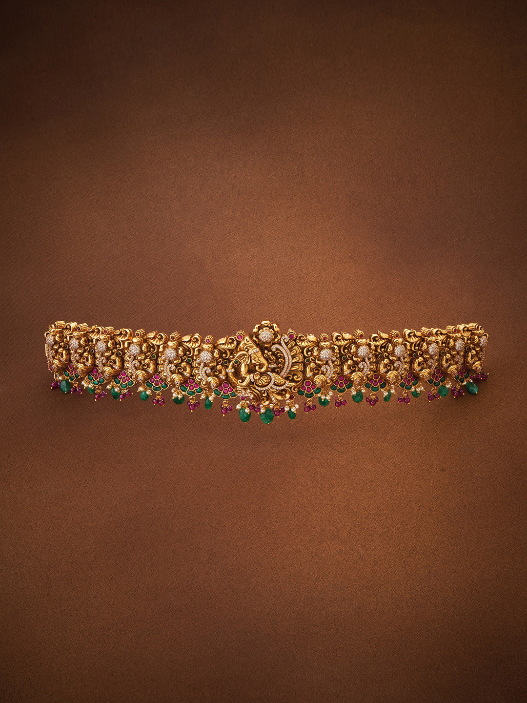 

Kushal's Fashion Jewellery Gold-Toned Green & Red Stone-Studded & Beaded Kamarbandh