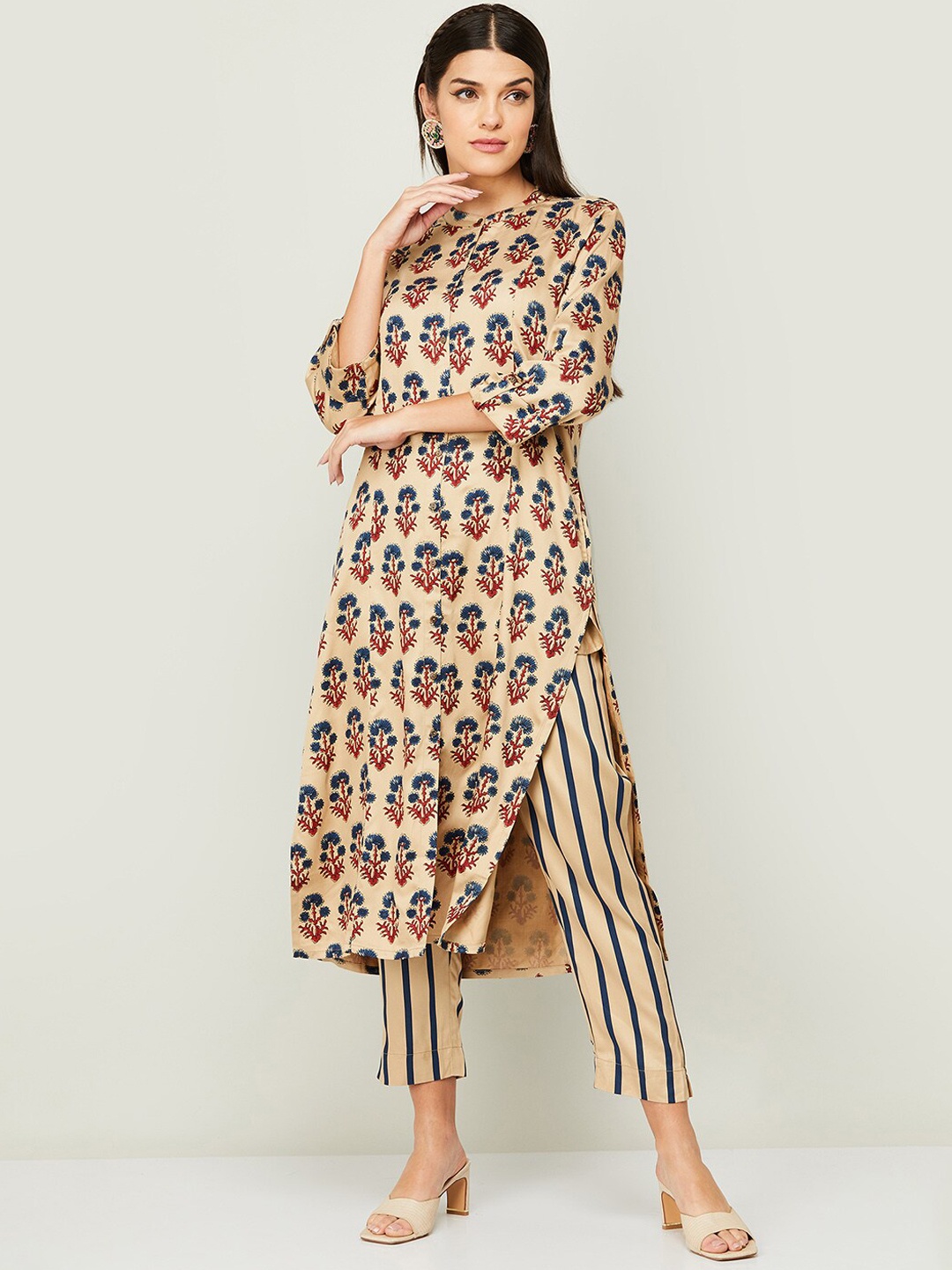 

Melange by Lifestyle Women Beige Floral Printed Kurta with Trousers