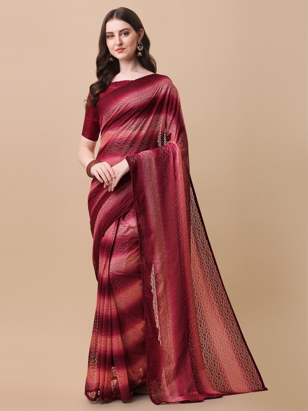 

Amrutam Fab Maroon & Pink Striped Jaali Net Saree