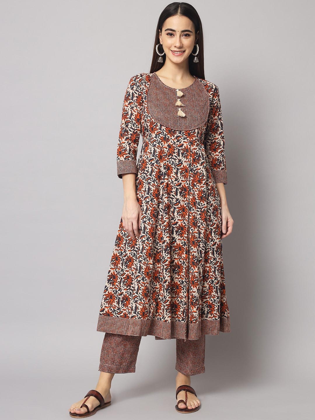 

Sutidora Women Brown Floral Printed Pure Cotton Kurta with Trousers