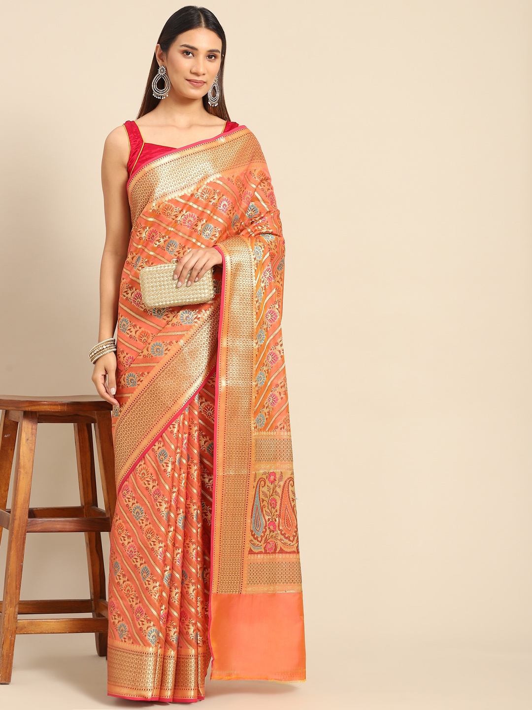 

Chhabra 555 Orange Floral Zari Silk Blend Banarasi Saree