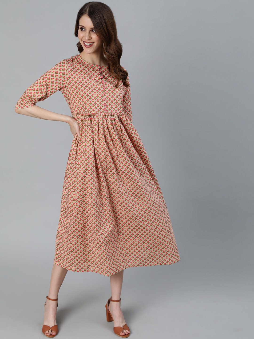 

antaran Women Beige Floral Printed A-Line Cotton Midi Dress