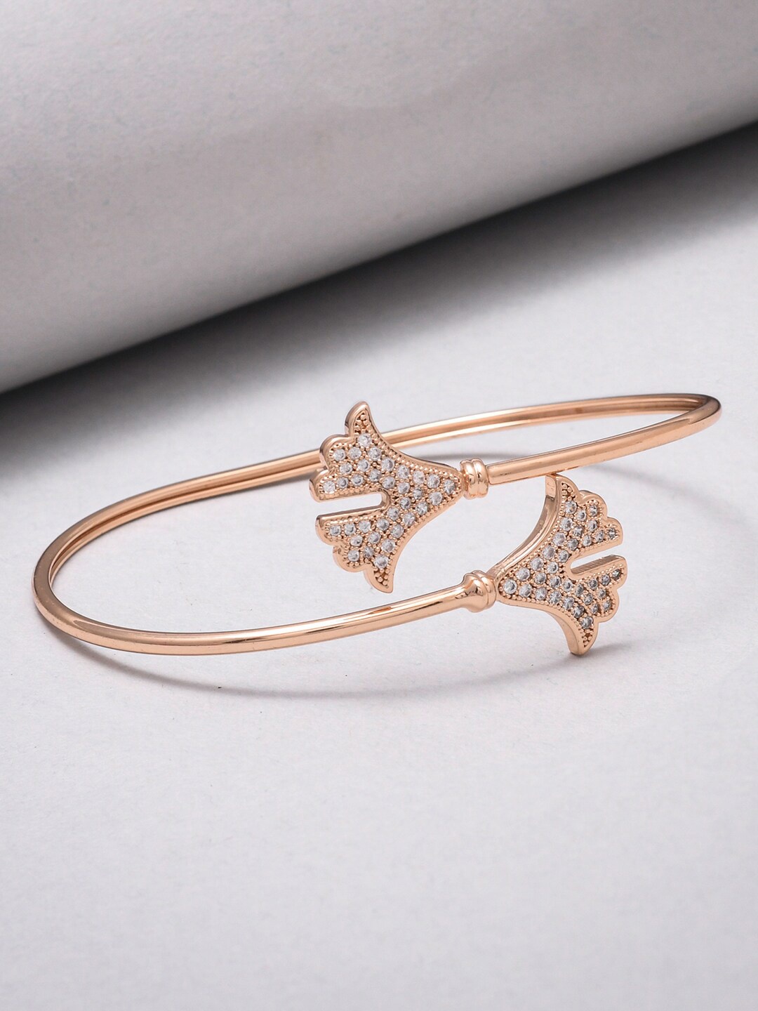 

Voylla Women Rose Gold & White Cubic Zirconia Rose Gold Plated Bangle Style Bracelet