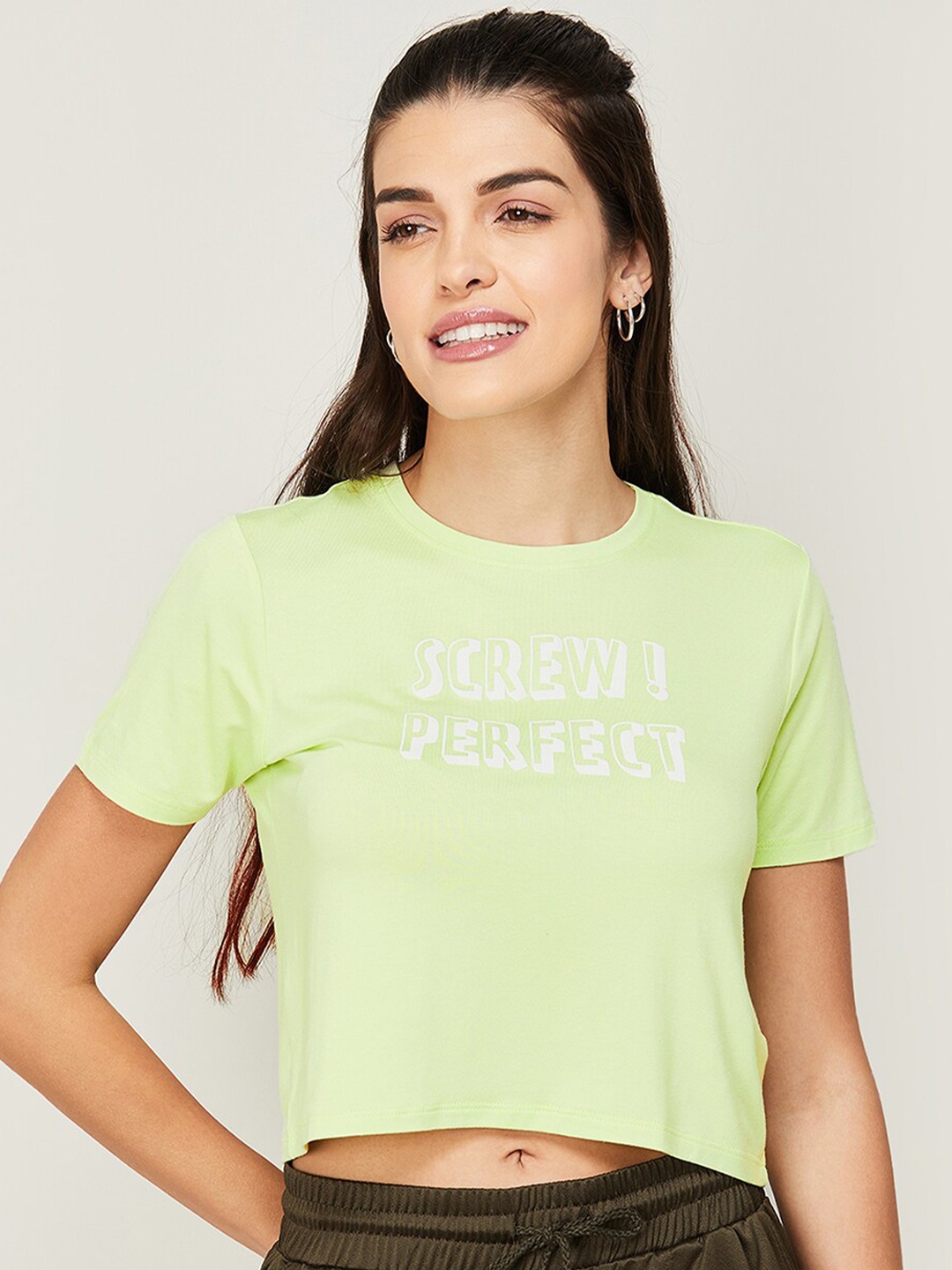 

Ginger by Lifestyle Women Lime Green Typography Printed Round Neck T-shirt