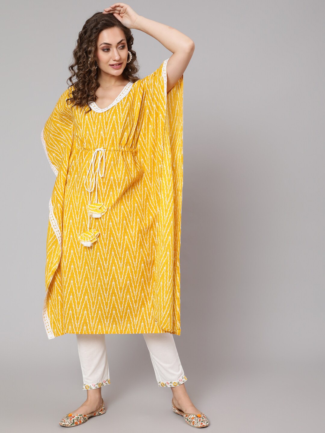 

antaran Women Yellow & White Chevron Flared Sleeves Cotton Kaftan Kurta