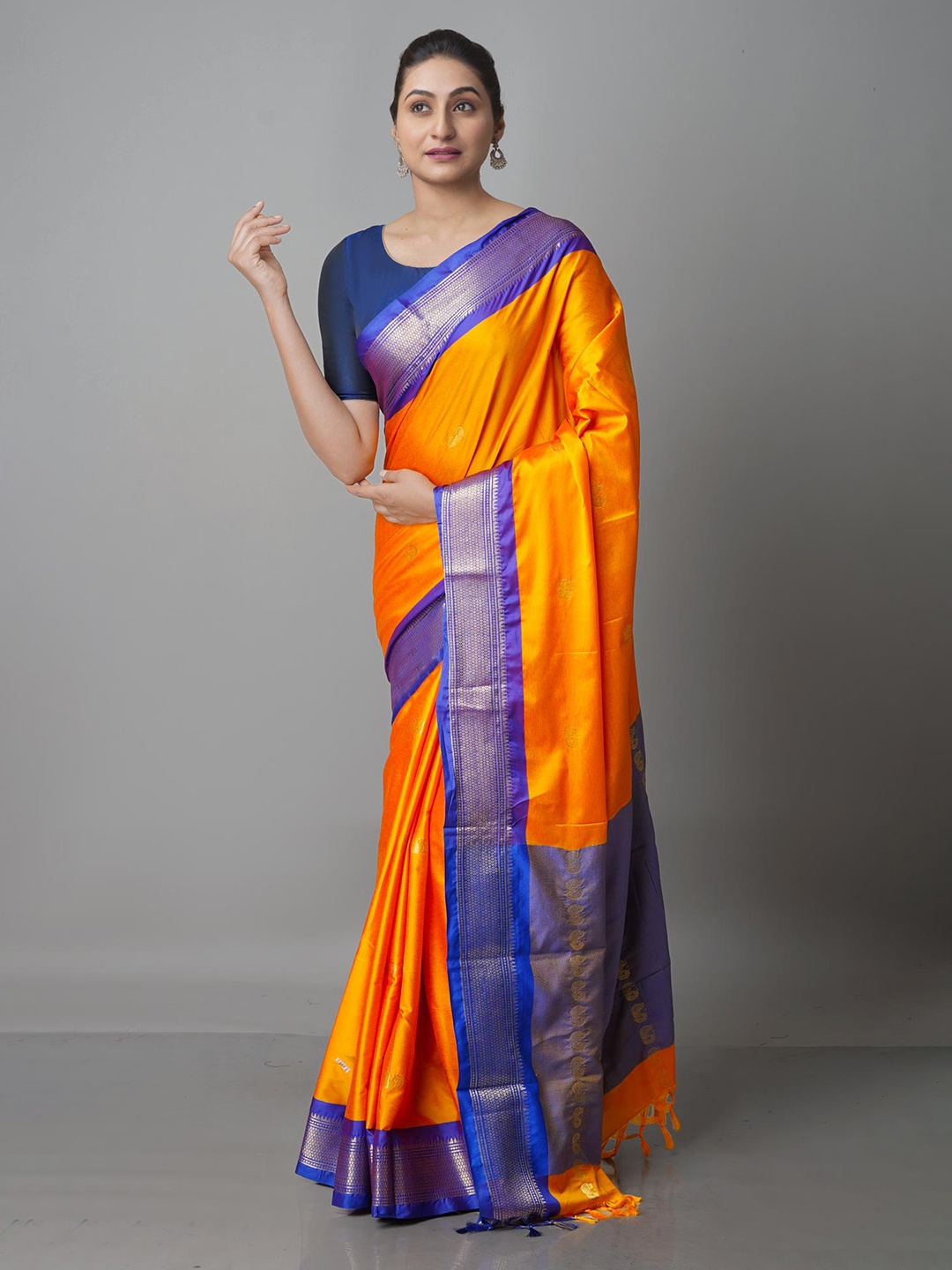 

Unnati Silks Yellow & Blue Ethnic Motifs Zari Silk Blend Kanjeevaram Saree