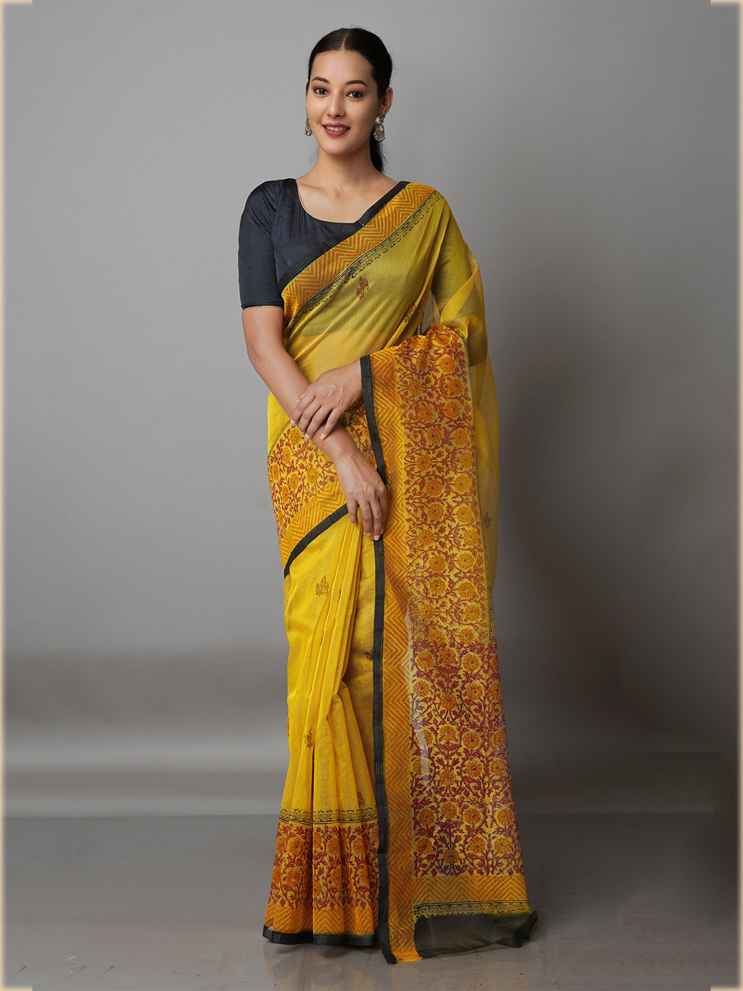 

Unnati Silks Yellow & Green Floral Banarasi Saree
