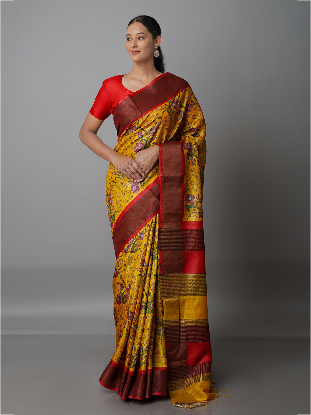 

Unnati Silks Yellow & Red Floral Zari Pure Silk Tussar Handloom Saree