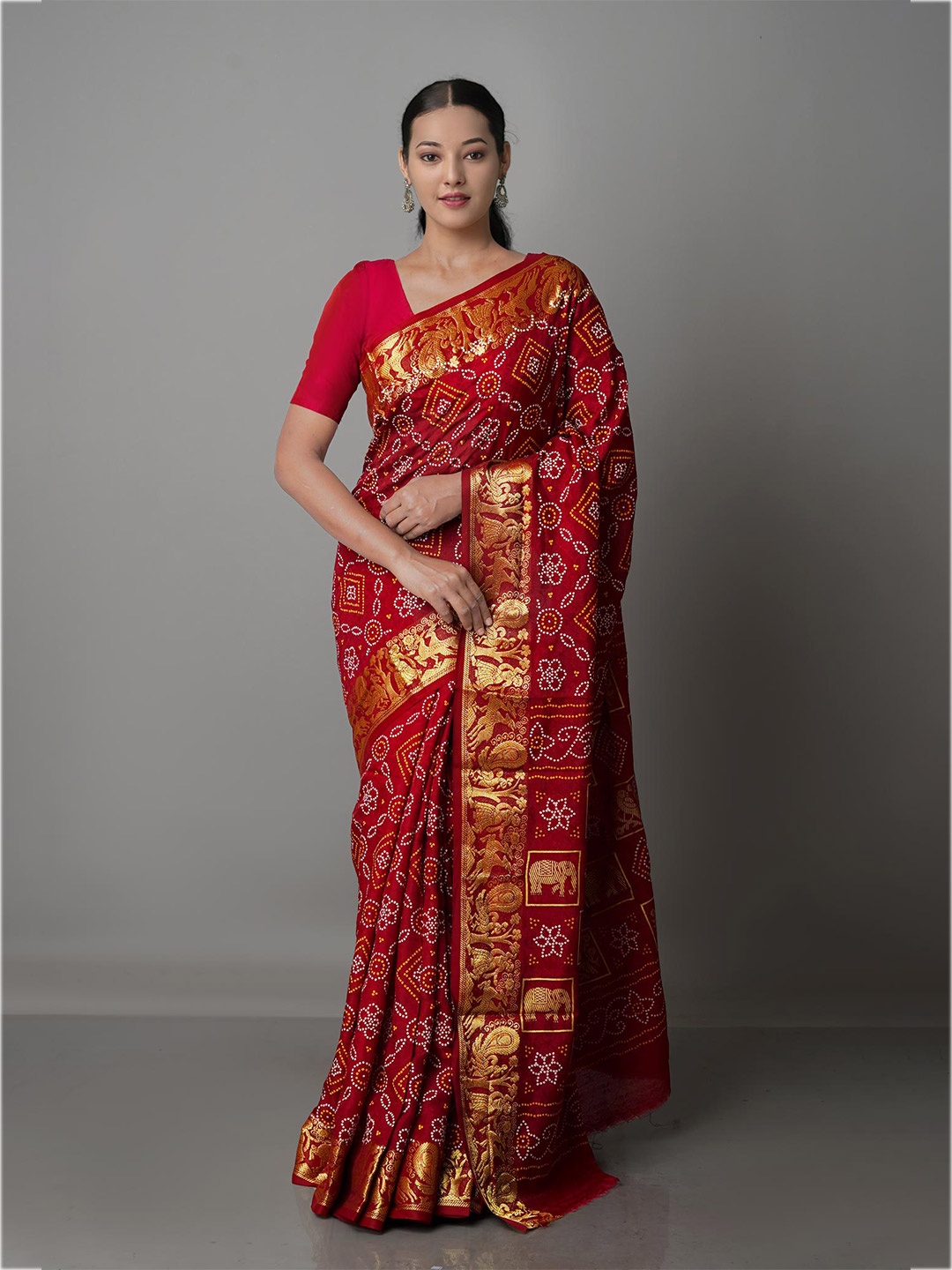 

Unnati Silks Maroon & White Bandhani Zari Silk Blend Bandhani Saree