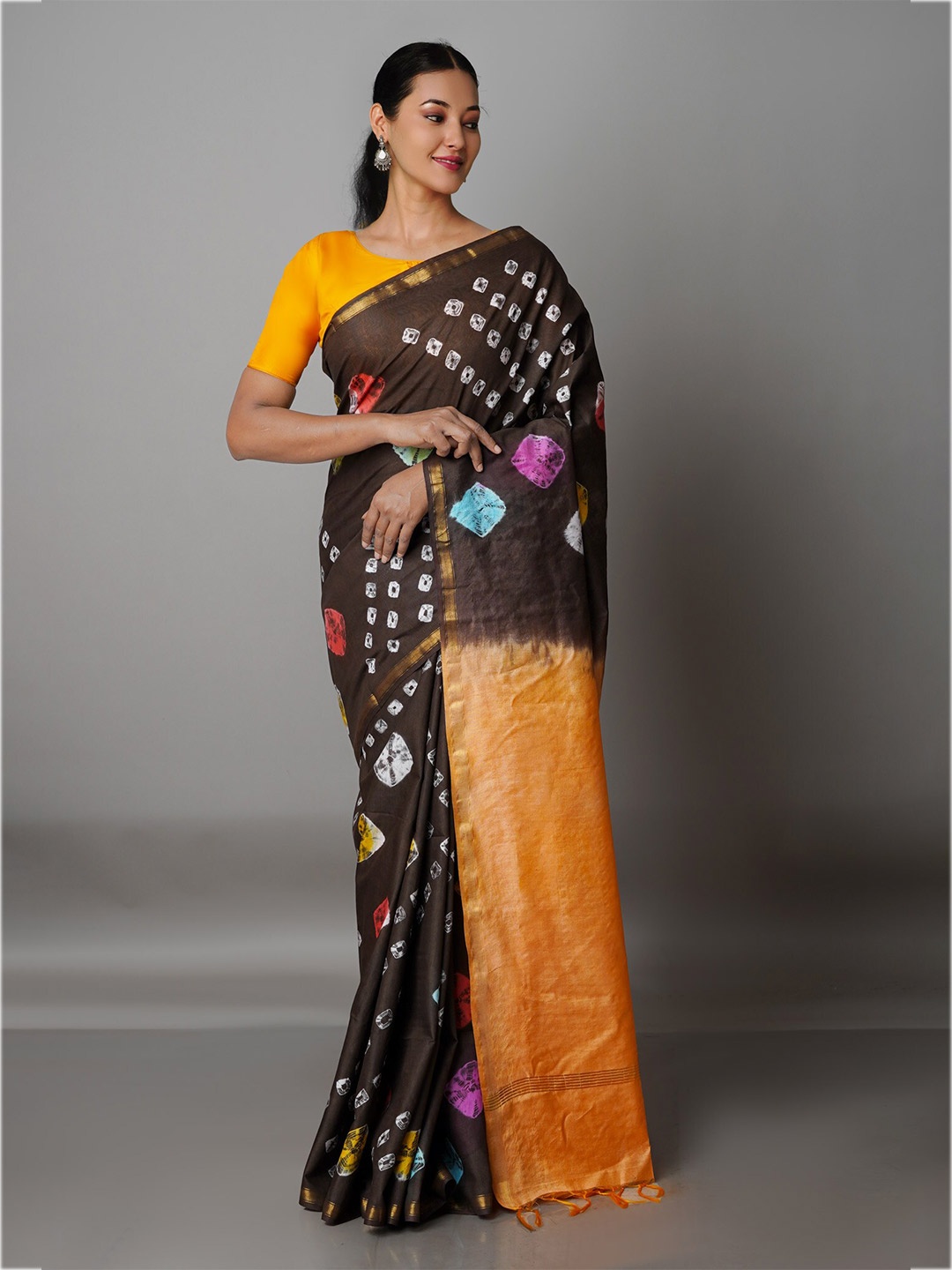 

Unnati Silks Brown & Orange Bandhani Zari Silk Cotton Chanderi Saree