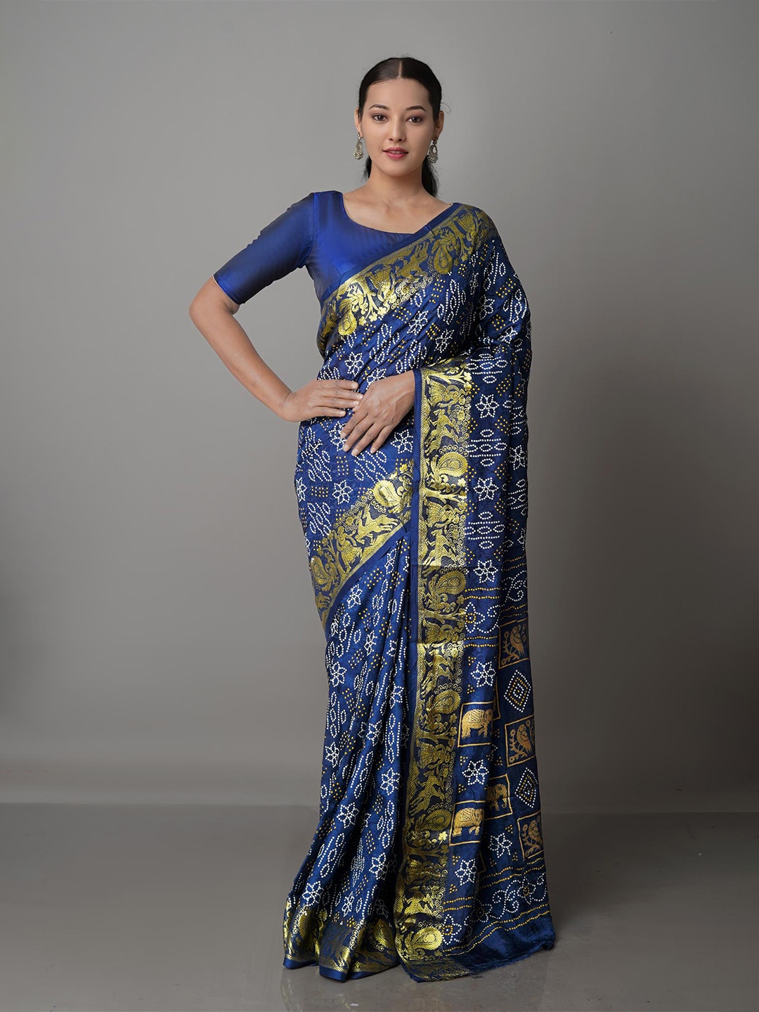 

Unnati Silks Navy Blue & White Bandhani Zari Silk Blend Bandhani Saree