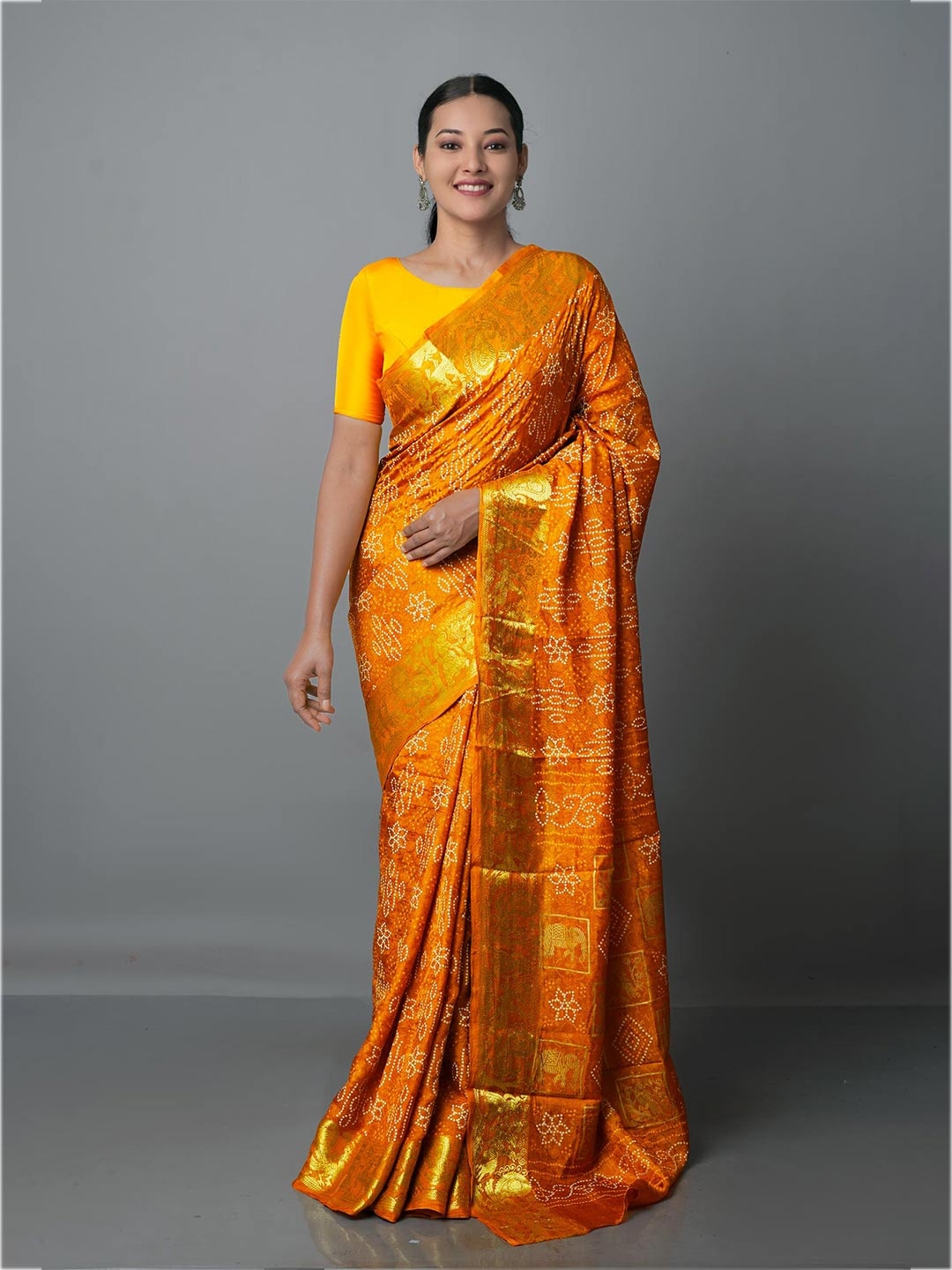 

Unnati Silks Yellow & Gold-Toned Bandhani Zari Silk Blend Bandhani Saree