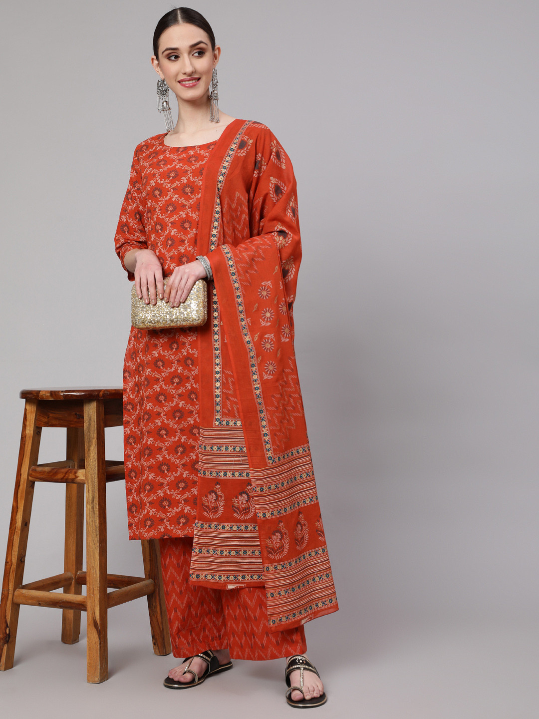 

Nayo Women Rust Floral Printed Kurta with Palazzos & Dupatta